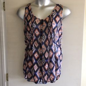 Women’s size 15-17 (xl jr) sheer sleeveless top